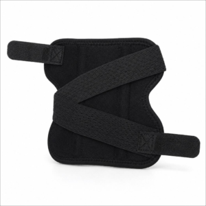 Black adjustable joint brace with two Velcro straps for secure wrap-around support (wrist/ankle).