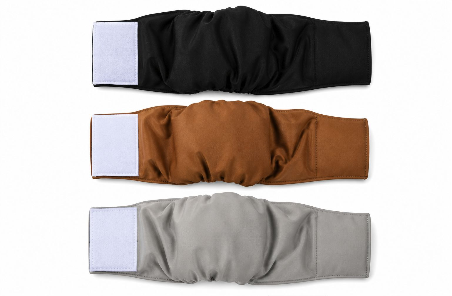 male-dog-diaper-3-pack-xs-rxw-686 - XCura Mobile Vet Three padded fabric wraps in black, brown, and gray, each with a white Velcro patch at the end.