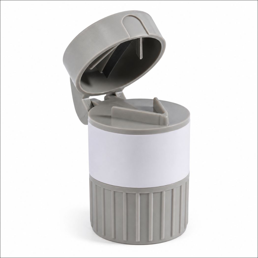 portable-pill-cutter-box-grey-rxw-680 - XCura Mobile Vet Gray travel bottle with a flip-top cap and ribbed gray base, wrapped with a white label in the middle